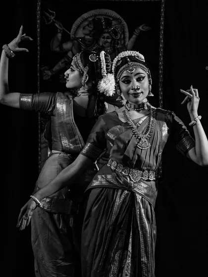 This artistic capture from our Ardhanareeshwara duet performance highlights the powerful symmetry and contrast that defines the piece. The interplay of light and shadow reflects the dual energies of Shiva and Shakti.