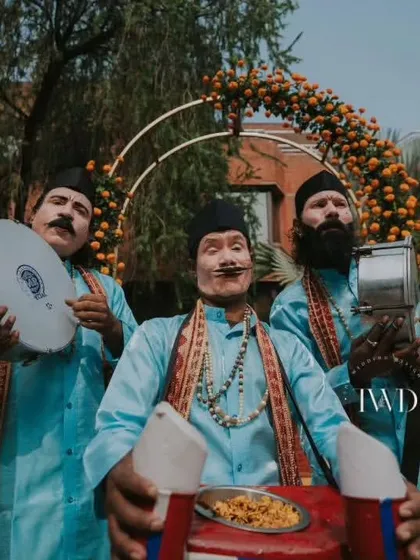 Entertainment with a side of snacks. We hired these fun "chana jor garam" performers who entertained guests with their folk artistry while serving up a classic Indian nibble during the Haldi ceremony.