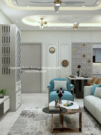 A living room where a pop of turquoise in the armchair and sofa brightens the entire space. The design is fresh, modern, and full of positive energy.