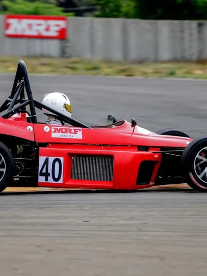 A Birel ART supported driver in a red Formula LGB car, number 40, navigating the track during their first experience in the series.