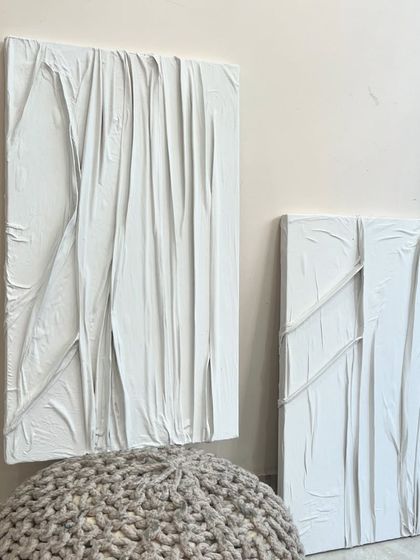 The two white fabric texture pieces displayed together. They are designed as a diptych but can also work as standalone artworks.