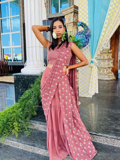 The entire look is a perfect inspiration for a modern wedding guest or bridesmaid attending an engagement party.