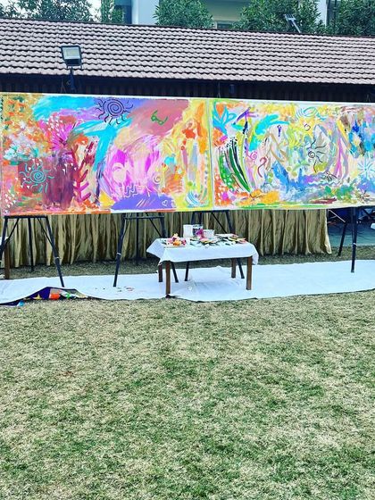 The complete setup for our group painting event, with two large canvases ready for guests to express themselves.