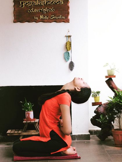 A simple back stretch in Vajrasana is a great way to increase back flexibility and relax the upper body. You can do this even while sitting in a chair at your office.