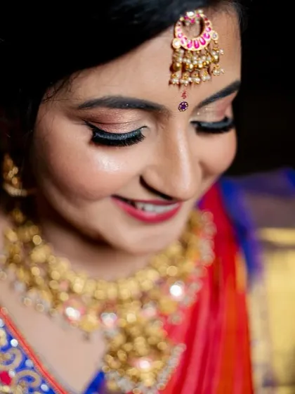 A close-up on the details. This engagement makeup features soft, shimmery eyeshadow, perfectly winged eyeliner, and full lashes to make the eyes pop, all while keeping the overall look fresh and radiant.