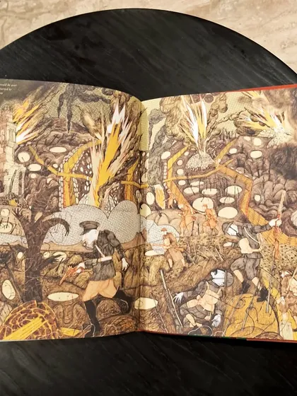 An intricate illustration from 'The Silk Roads', showing the chaos and energy of battle along the historic trade route.