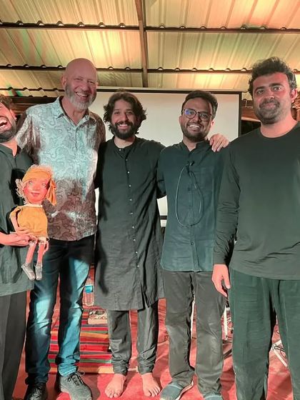The cast of 'Buried Treasures' posing with musician Loy Mendonsa in Goa. These interactions on our tours are a cherished part of our journey as a travelling ensemble.