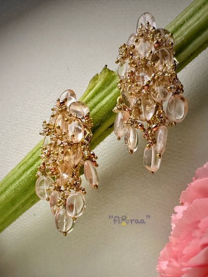 These peach blush earrings are one of my favorites. They are crafted with rose quartz gemstones for a delicious, feminine look.