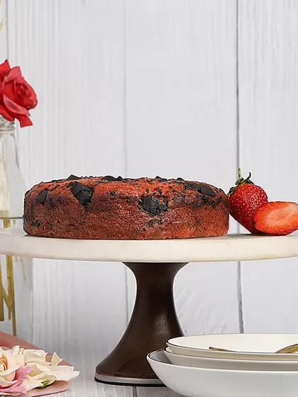 This is my all time bestseller, the Strawberry Dark Chocolate cake. It’s completely eggless, butter-free, and sugar-free. I always suggest heating it for a few seconds before eating, it truly feels like heaven.