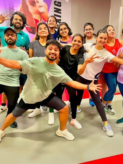 A fantastic group shot filled with happy faces and great energy. This is what a successful Zumba session looks like.