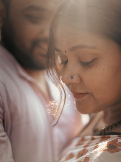 An artistic, soft-focus portrait of the bride-to-be. The gentle light and her serene expression create a dreamy and ethereal mood.