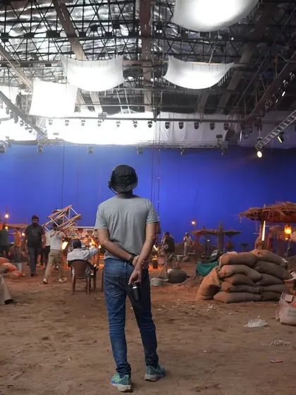 The 'Uyi Amma' set from the ground, showing the practical set pieces that will be integrated with the blue screen background, all lit by our team.