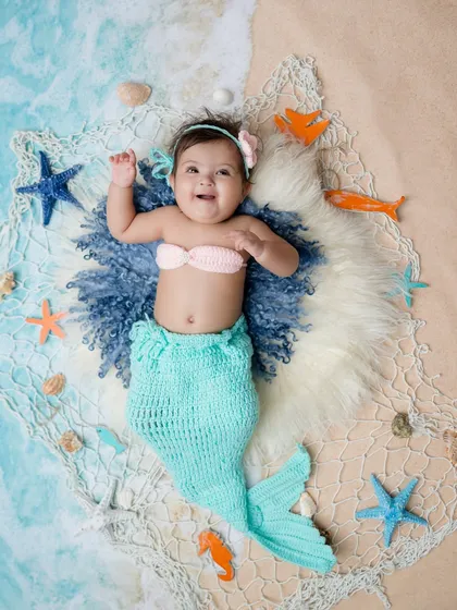 A little mermaid princess! This newborn photoshoot theme is so sweet for baby girls.