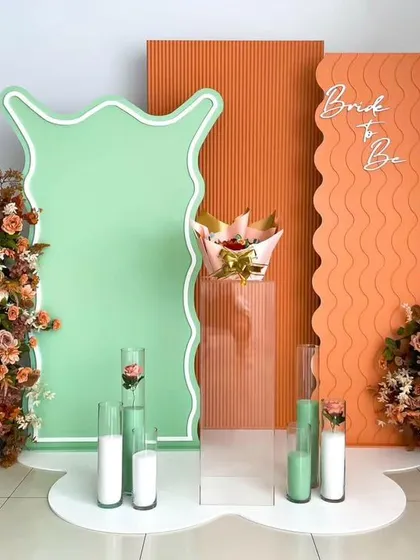 For the modern bride, I designed this chic and vibrant "Bride to Be" setup. The combination of mint green and textured orange panels, along with custom neon signage, creates a contemporary and stylish backdrop perfect for a bachelorette or bridal shower.
