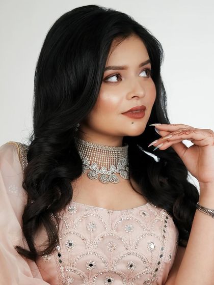 A candid-style shot that looks natural and effortless, showcasing the wearability of the makeup.