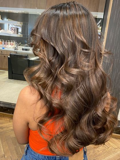 Another view of the French mocha balayage, showing the beautiful blend of colors and healthy shine.