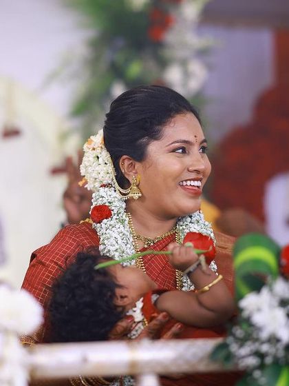 A candid moment of pure joy between mother and child during the ceremony. My goal is to create an atmosphere where families can relax and soak in these priceless interactions.