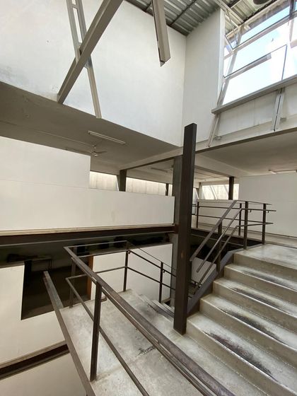 The main staircase at the Zanav Home studio, showing the wear of over ten years of use. For us, these signs of life are not flaws but a testament to a building being lived in and loved.