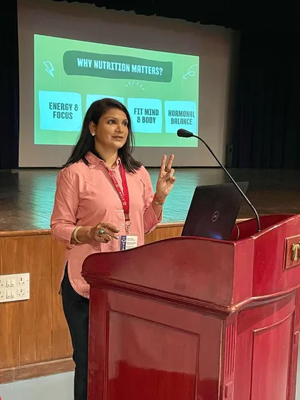 Here I am speaking to students about why nutrition truly matters. It's not just about weight; it's the foundation for energy, focus, a fit mind and body, and hormonal balance. I am passionate about educating people on the profound impact of their food choices.