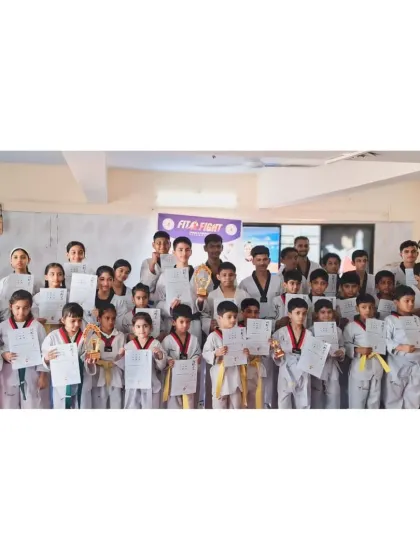 Success is a team effort. Here is a group of our students proudly holding their certificates after successfully passing their belt promotion exam, marking another step forward in their martial arts journey.