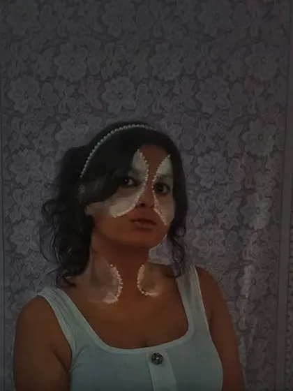 This is a moon-inspired makeup look I created. Using white and silver tones, I designed a celestial, glowing effect on the face and neck, showing that styling can be as simple and creative as makeup.