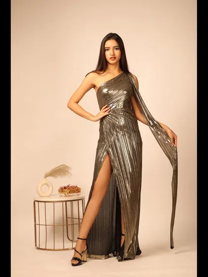 A final full-length shot, showing the complete look with a powerful stance.
