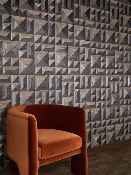 For those who appreciate modern innovation, our 3D wallcoverings offer sculptural elegance. This design, featuring geometric wood veneer, plays with light and shadow to create a dynamic and visually engaging surface.