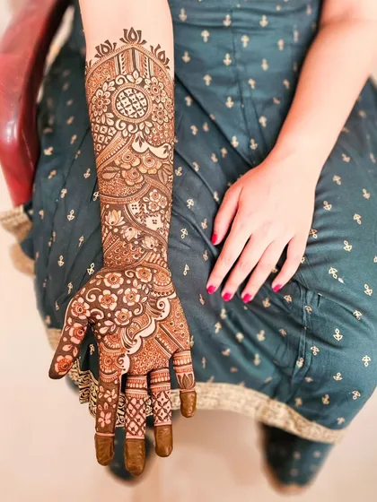 Another view of the same design, showing the detailed work on the palm.