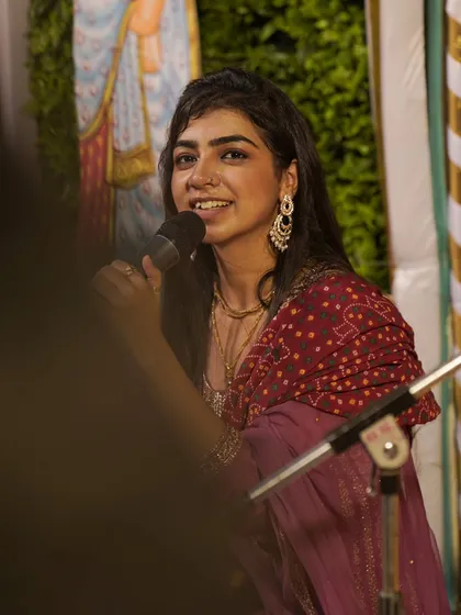 Singing a bhajan at a Vrindavan event. The divine atmosphere of Braj always inspires my music.