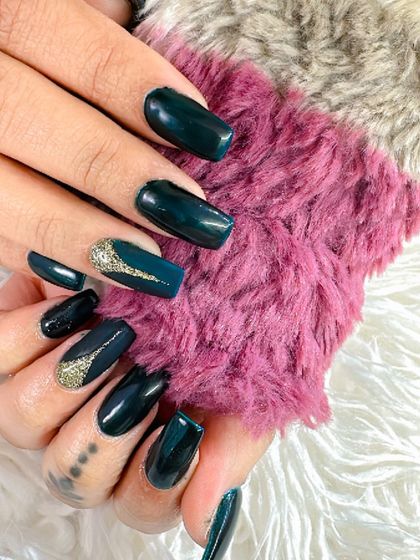 Another angle of these gorgeous deep teal nails, showing how the color looks against a soft texture.