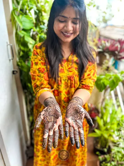 A happy client showing off her beautiful Karwa Chauth henna. It's always the best feeling to see someone so pleased with my work.