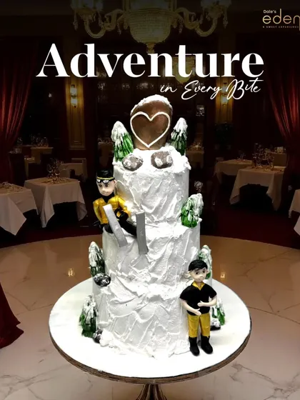 An adventure in every bite. This multi-tiered skiing-themed cake captures a winter wonderland with snowy slopes, frosted trees, and fondant skiers, bringing a cool vibe to any celebration.