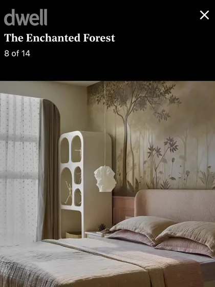Another shot of the 'Enchanted Forest' mural in its bedroom setting, featured in Dwell. The artwork's muted palette and dreamy quality create a peaceful and sophisticated environment.
