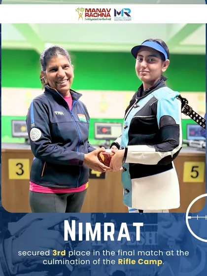 Nimrat, one of our promising young shooters, receives her 3rd place prize from Coach Deepali Deshpande at the conclusion of our specialized rifle training camp.