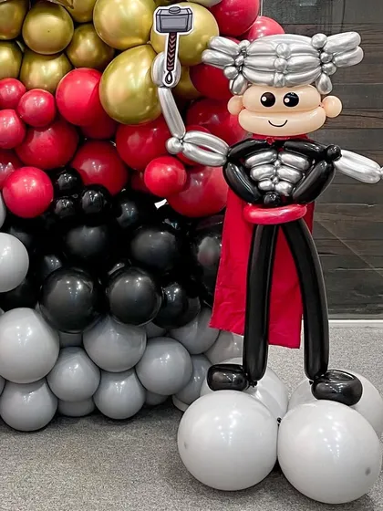 A close-up of the mighty Thor balloon sculpture. I used different balloon twisting techniques to create his armor, helmet, and hammer, ensuring every detail is worthy of an Avenger.