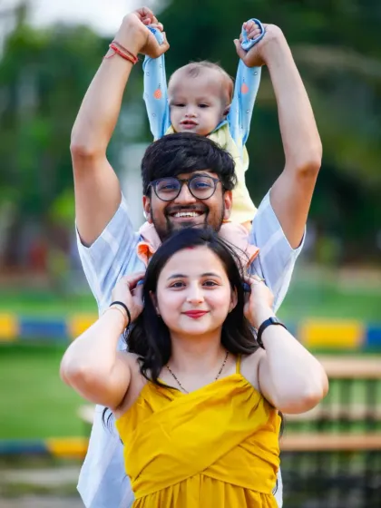 Family photoshoots should be fun and reflect your family's personality. We love creating playful and dynamic compositions like this outdoor family stack, capturing genuine smiles and laughter.