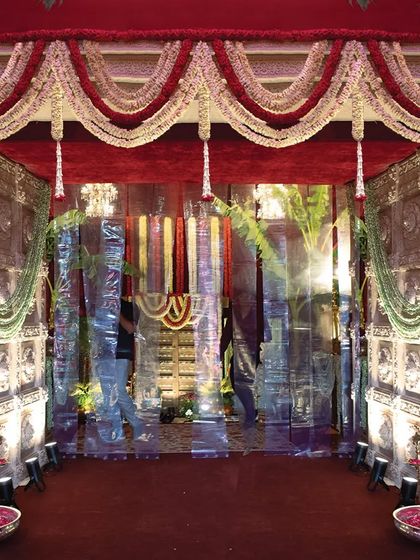 This grand gateway, inspired by Udaipur's royal legacy, was designed to make a majestic first impression. The intricate detailing and traditional floral arrangements signal the start of an extraordinary and lavish wedding experience.