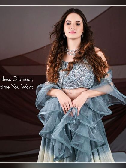 Effortless glamour, anytime you want. This grey ombre lehenga with a ruffled dupatta is a modern and chic choice.