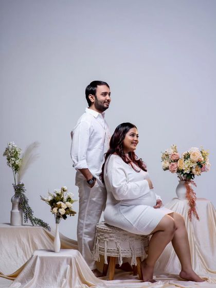 A formal yet relaxed portrait of the couple looking towards the future. This composition has a classic, regal feel, beautifully capturing their poise and anticipation.