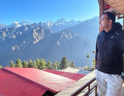 Standing on the balcony in Auli, taking in the vastness of the Himalayan range. I encourage everyone to explore the beauty of our own nation first.
