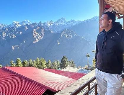 Standing on the balcony in Auli, taking in the vastness of the Himalayan range. I encourage everyone to explore the beauty of our own nation first.