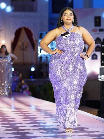 The lavender sequined plus-size gown again, a crowd favorite for its unique color and flattering design.