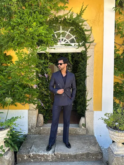 Surrounded by lush greenery, the deep navy of the Lisbon suit provides a beautiful contrast.