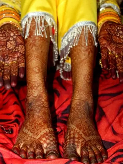 Complete your bridal look with henna for both hands and feet. This design shows how I coordinate the patterns from the hands to the feet for a cohesive and traditional bridal adornment.