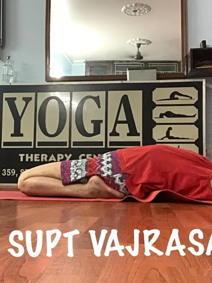 Supta Vajrasana, or Reclined Thunderbolt Pose. This is an intense stretch for the thighs and a deep backbend.