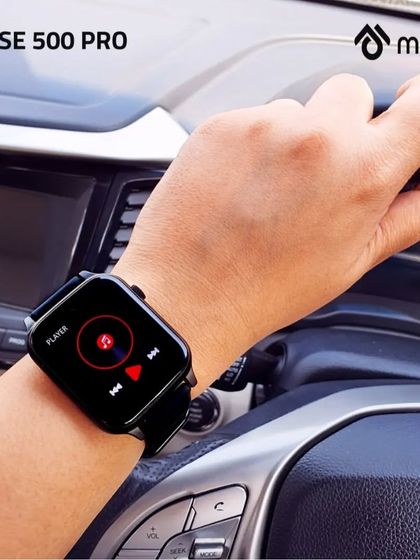 Capturing the music player feature of the smartwatch while on the go. This in-car shot shows how the product seamlessly integrates into a user's active lifestyle, from work to commute.