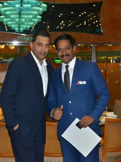 Posing with a manager on the ship. It was a pleasure to be part of such a great entertainment team.