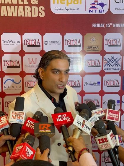 Surrounded by media after the awards ceremony. It's always humbling to receive this level of attention for our work.