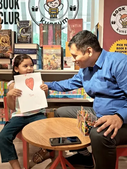 A beautiful moment between a father and daughter at our art table. We love being a place where families can connect and create together.