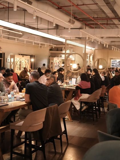 A full house at Comorin. This image captures the lively, buzzing energy of our restaurant during a busy service, showcasing its appeal as a popular venue for dining and socializing.